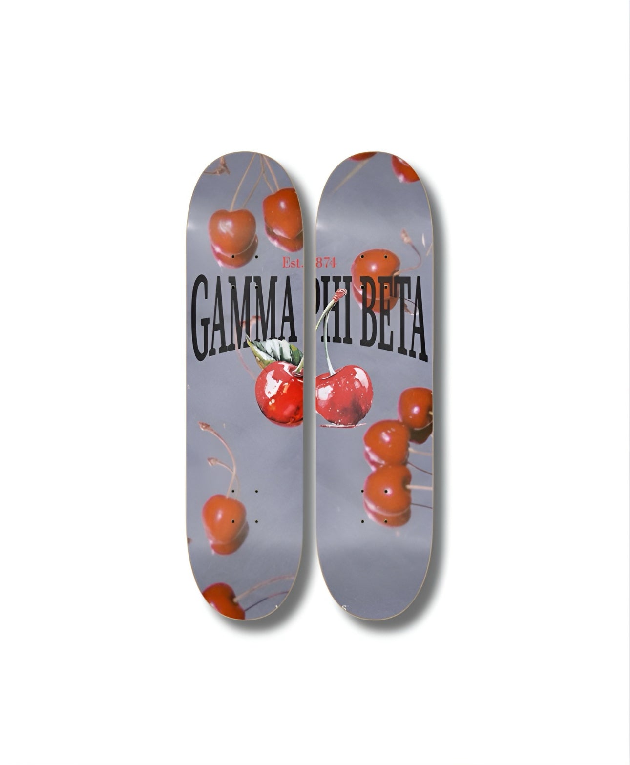 Two skateboard decks with cherry design and 'Gamma Phi Beta' text on a white background